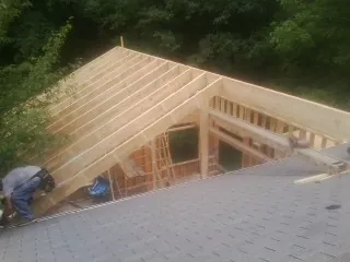 Framing a new roof addition that ties into an existing shingle roof in Matagorda